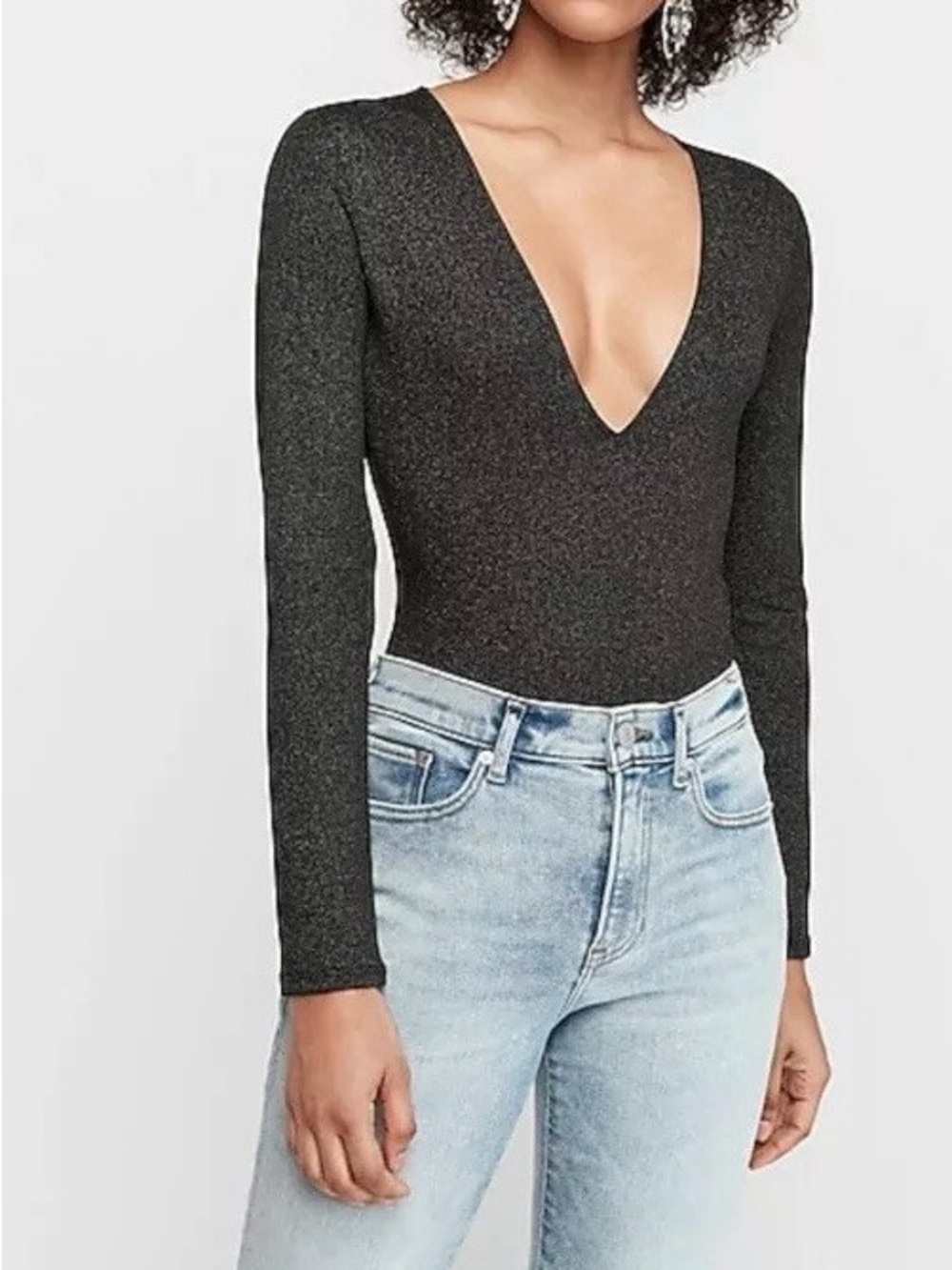 Express bodysuit features a metallic shimmer and a deep plunge neckline